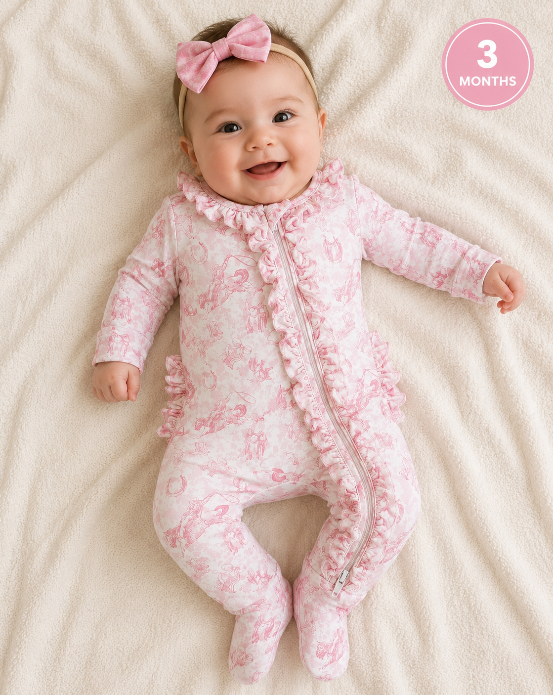 baby girl in western themed footie sleeper made from bamboo