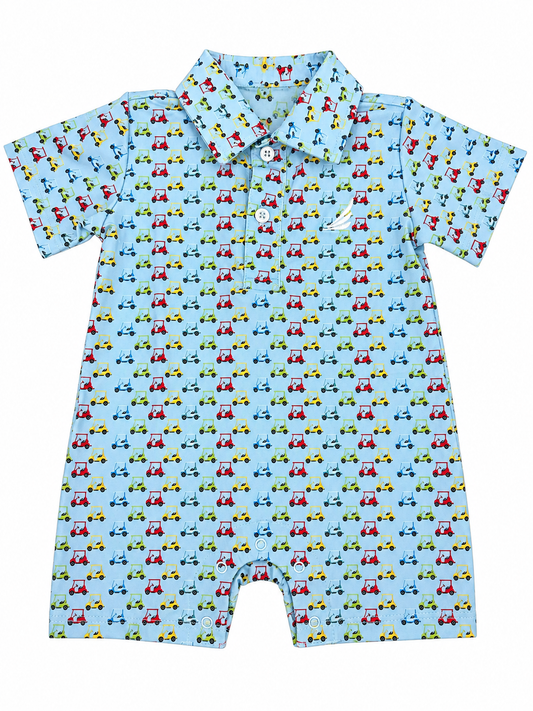 Children's romper with golf cart pattern on a light blue background made from performance fabric 