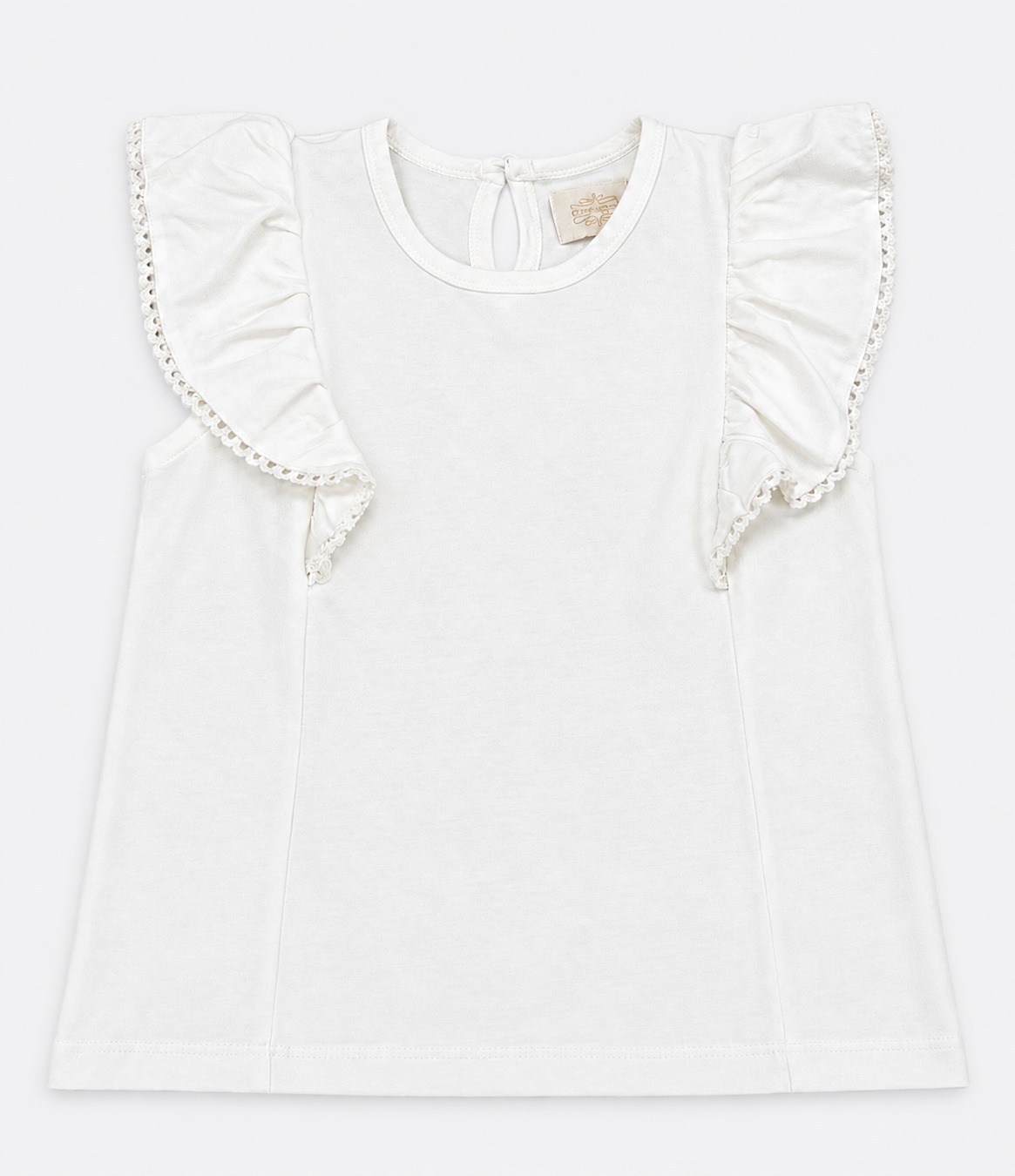 Off-white  blouse with ruffled shoulders on a light gray background